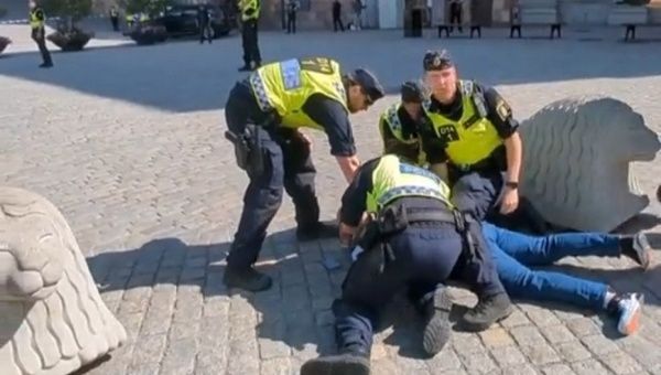 Police arrest a Muslim who attempted to avoid a Quran burning in Sweden, 2023.