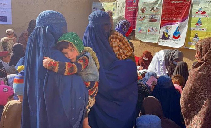 Women and children wait for nutritional aid in Kandahar, Afghanistan, 2023.