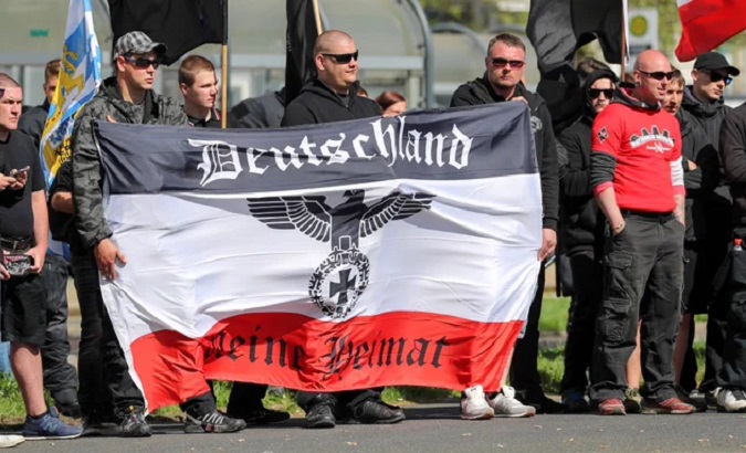 A flag reading “Germany my homeland,” Chemnitz, Germany, 2018.
