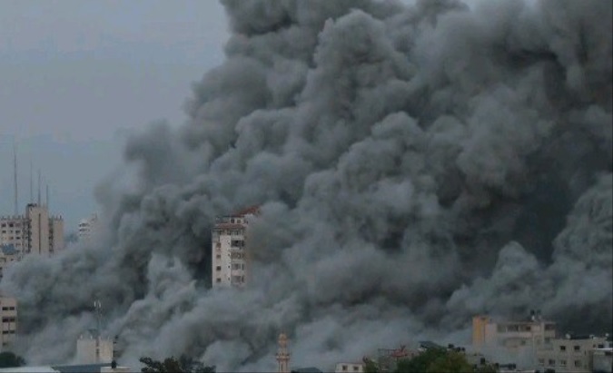 Dust raised by Israeli bombings in downtown Gaza, Oct. 7, 2023.