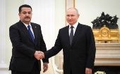 Russian President Vladimir Putin and Iraqi Prime Minister Mohammed Shia