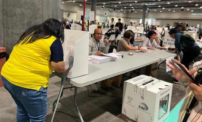 Ecuadorians vote at a polling station in Madrid, Spain, Oct. 15, 2023.