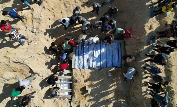 Palestinians bury victims of Israeli bombing, Oct. 31, 2023.