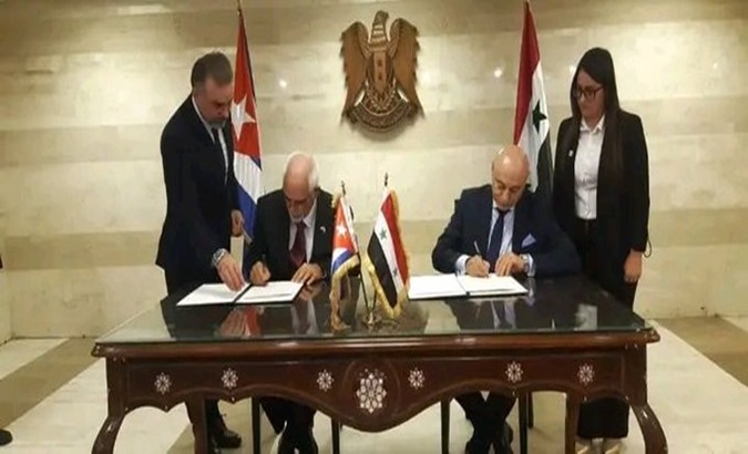 The document was signed by the Cuban ambassador to Syria, Luis Mariano Fernandez, and the director of the Syrian diplomatic institution, Imad Moustafa. Nov. 20, 2023.
