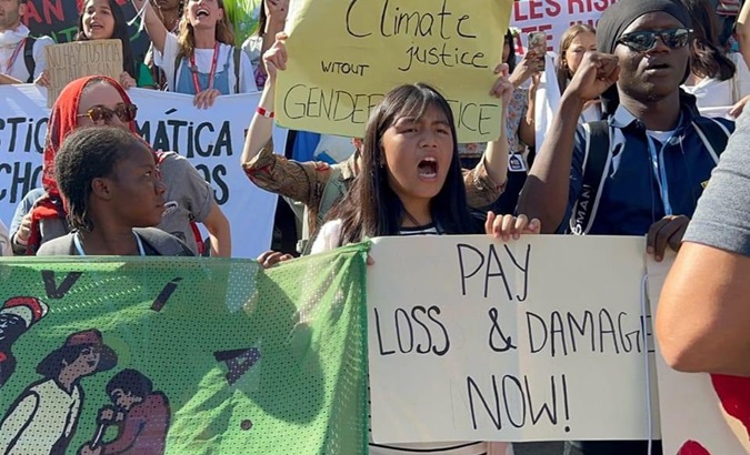 People demand compensation for the Global South countries most affected by climate change.