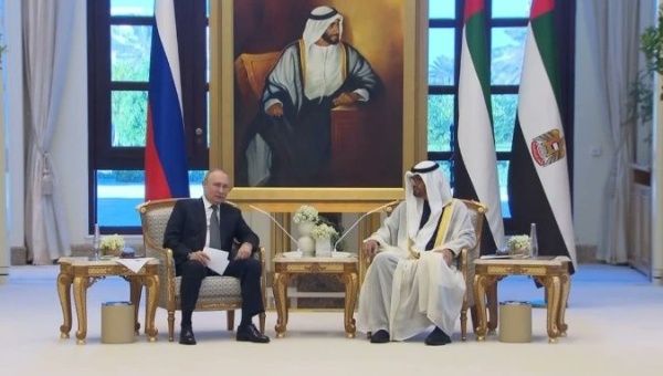 Vladimir Putin (L) and  Mohamed bin Zayed Al Nahayan (R), Dec. 6, 2023.