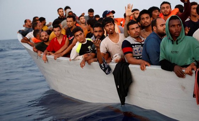 Migrants at the Mediterranean sea, 2023.