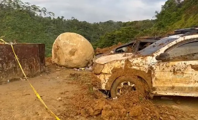 Cars buried by a landslide in the Choco Department, Colombia, Jan. 14, 2024.