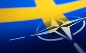 An image merging the flags of Sweden and NATO.
