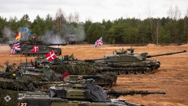 Tanks from NATO member countries in a military exercise, 2023.