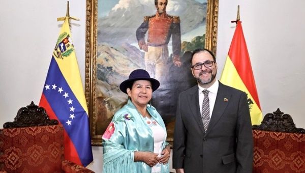 Bolivian FM Celinda Sosa (L) & Venezuelan FM Yvan Gil (R), Feb. 15, 2024. 