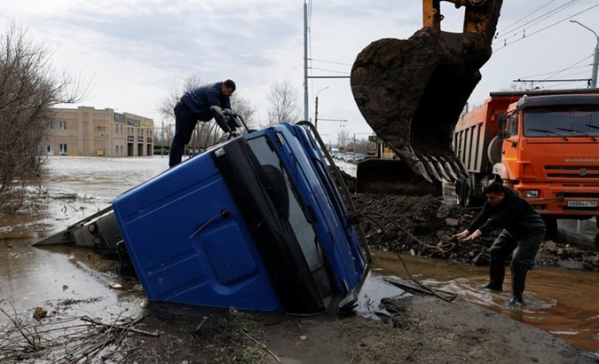 Cleanup work on flood damage in Orenburg, Russia, April 12, 2024.