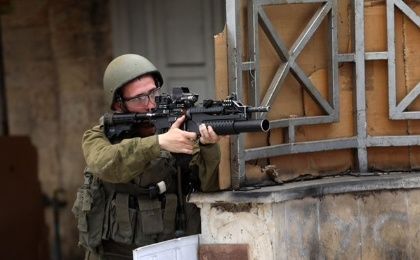 A Zionist soldier in Gaza, April 2024.
