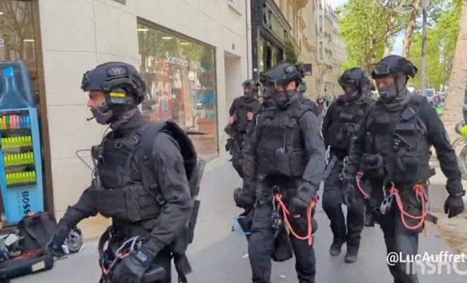 Police heading to the Sciences Po building in Paris, May 3, 2024.