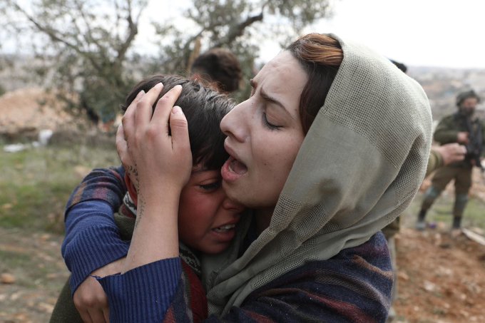 ´Palestinian Mother holding her son, April 2024