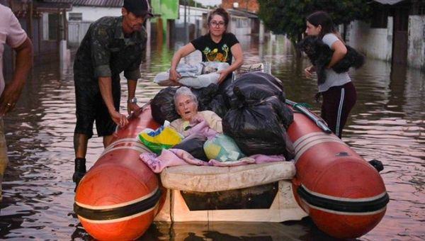 Elderly woman rescued from the flood in Rio Grande do Sul, Brazil, May, 2024.