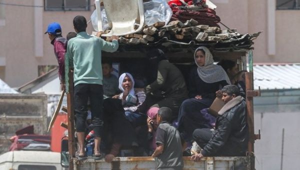 Palestinians flee Rafah with their household belongings, May 6, 2024.