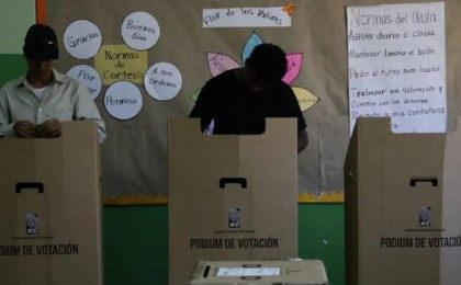 Two men voting this Sunday in the Dominican Republic elections.