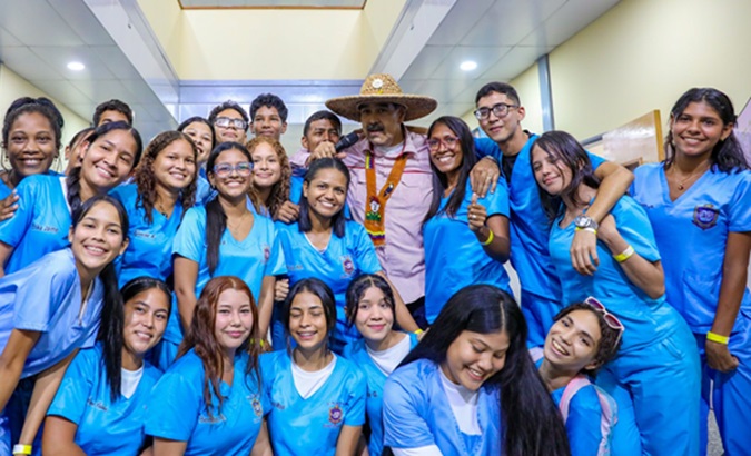 Venezuela President Nicolas Maduro surrounded by health sciences students, May 28, 2024.
